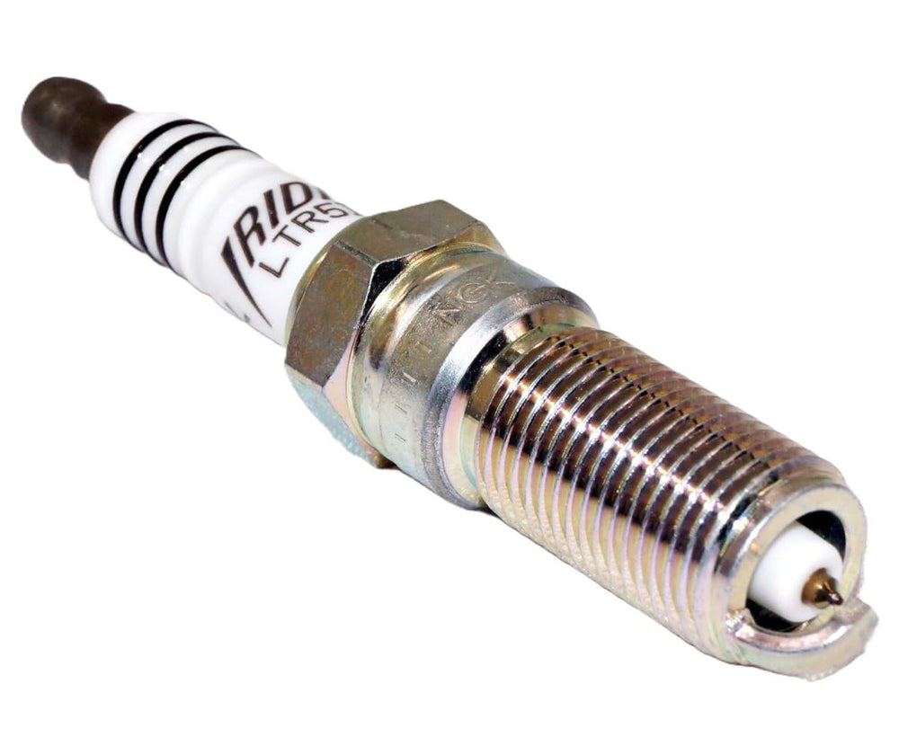 Spark plugs ready for installation into a Silverado engine bay