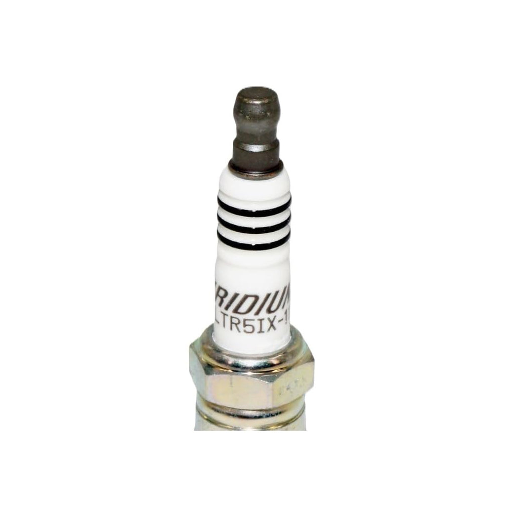 Corrosion-resistant NGK spark plug shell visible on a plug