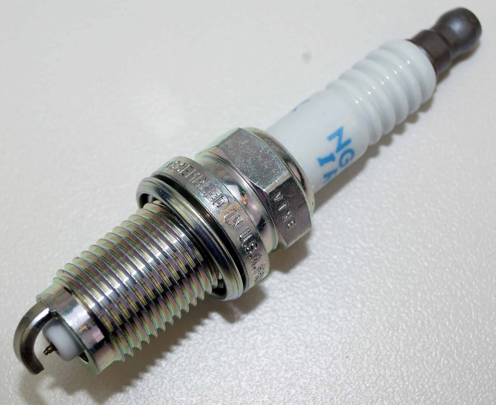 NGK IZFR6K11 spark plug original packaging shows genuine quality and parts.