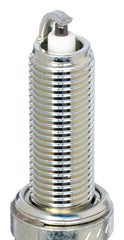 NGK LMAR8C-9 spark plug insulation detail highlighting alumina silicate core.