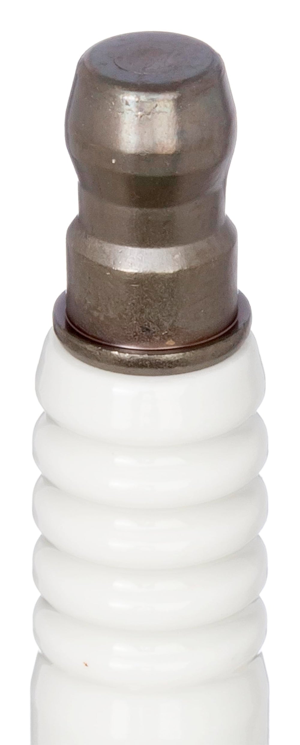 NGK LMAR8C-9 spark plug with threaded base and ribs to prevent flash over.