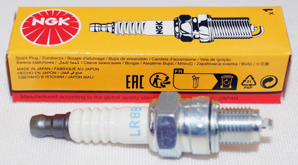 NGK LR8B spark plug tip close-up highlighting precision gap for smooth starts