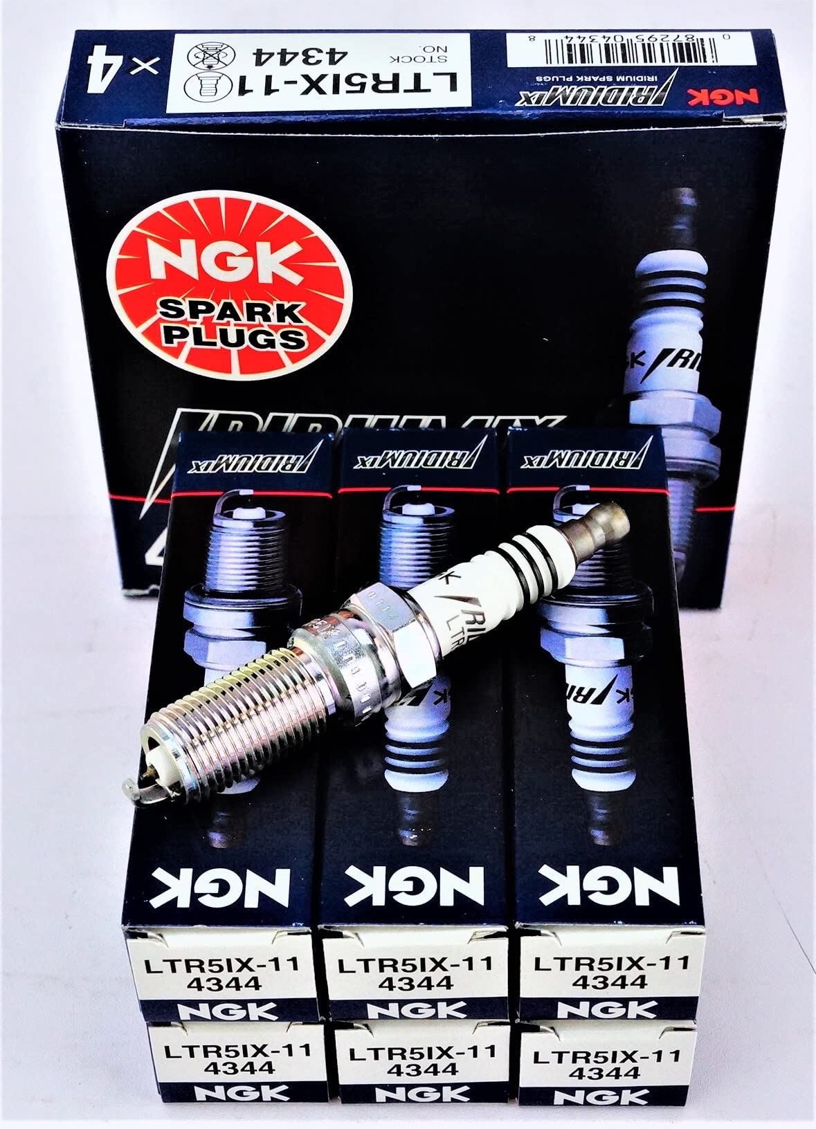 NGK LTR5IX-11 iridium spark plug closeup with fine-wire center electrode.