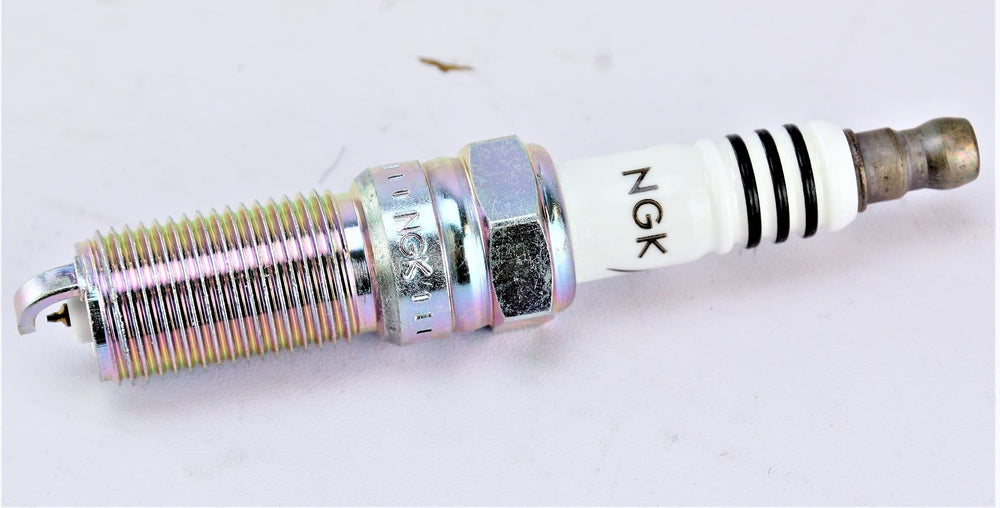 NGK LTR5IX-11 installed in engine bay for reliable ignition.