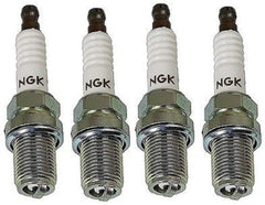 NGK 4554 racing spark plug in a 4-pack for high-performance engines