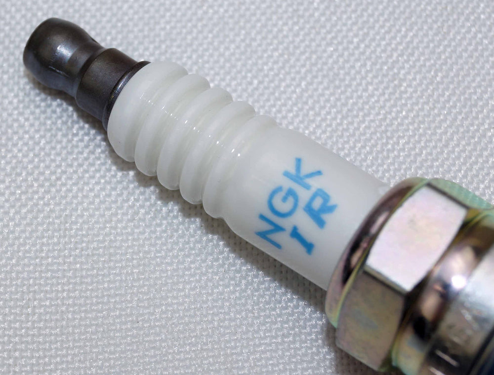 NGK four-pack supports spare plugs for maintenance planning
