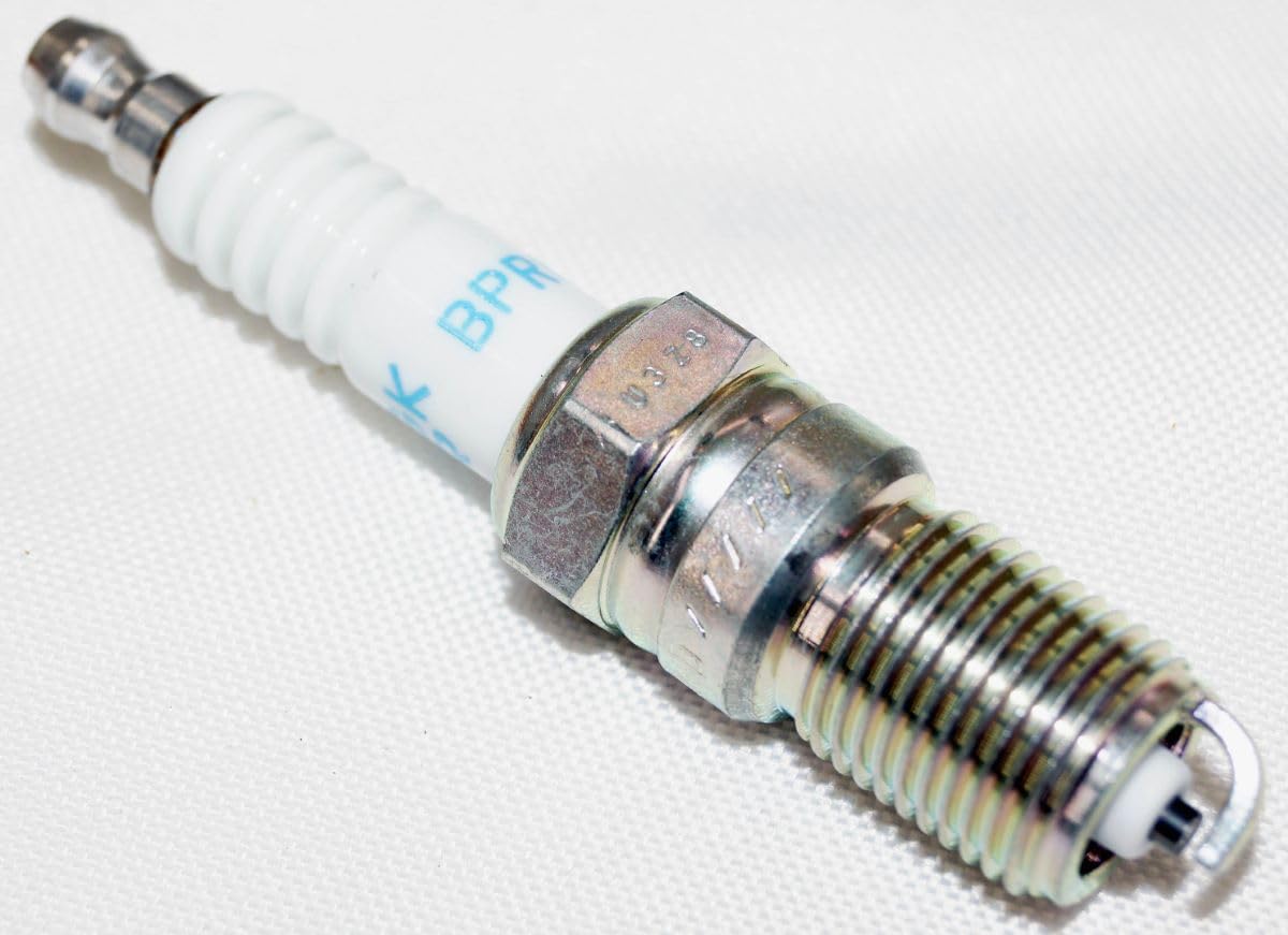 NGK spark plug 3623 materials close-up in cast iron and aluminum