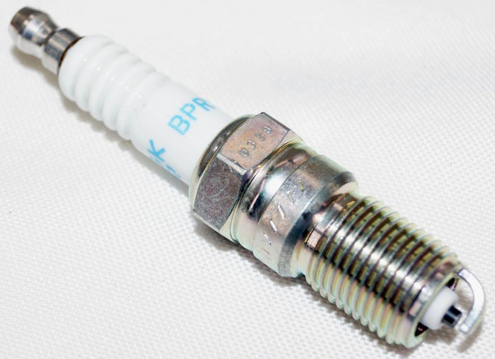 NGK spark plug 3623 materials close-up in cast iron and aluminum