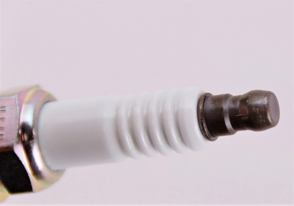 NGK spark plug 7100 ZFR6FGP in-use illustration suggests easy installation