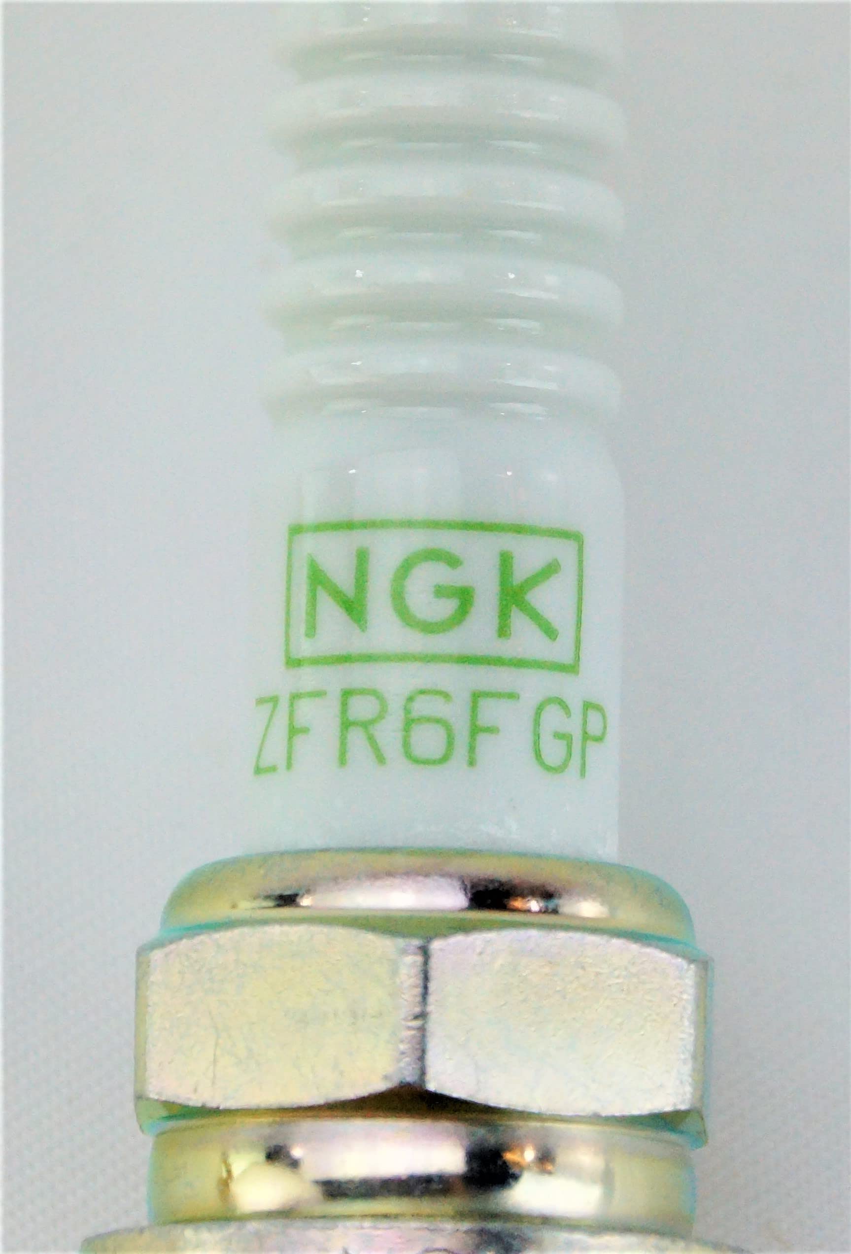NGK 7100 ZFR6FGP image emphasizes robust hardware and sealing
