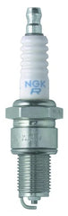 NGK spark plug 7131-4PK insulator detail reveals corrugated ribs for flashover prevention