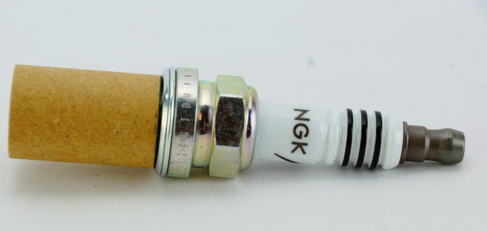 Spark plug box label with NGK branding and part number.