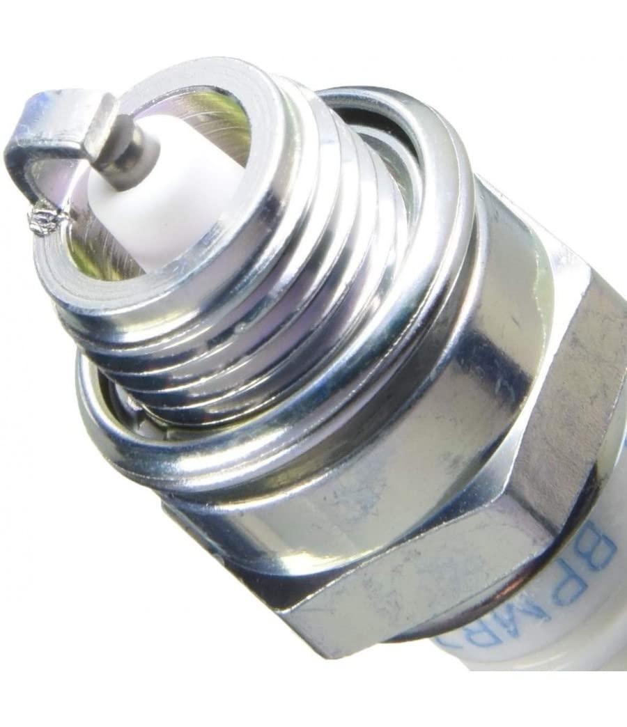 NGK BPMR7A spark plug installed in an engine demonstrates fit and potential reliable ignition.