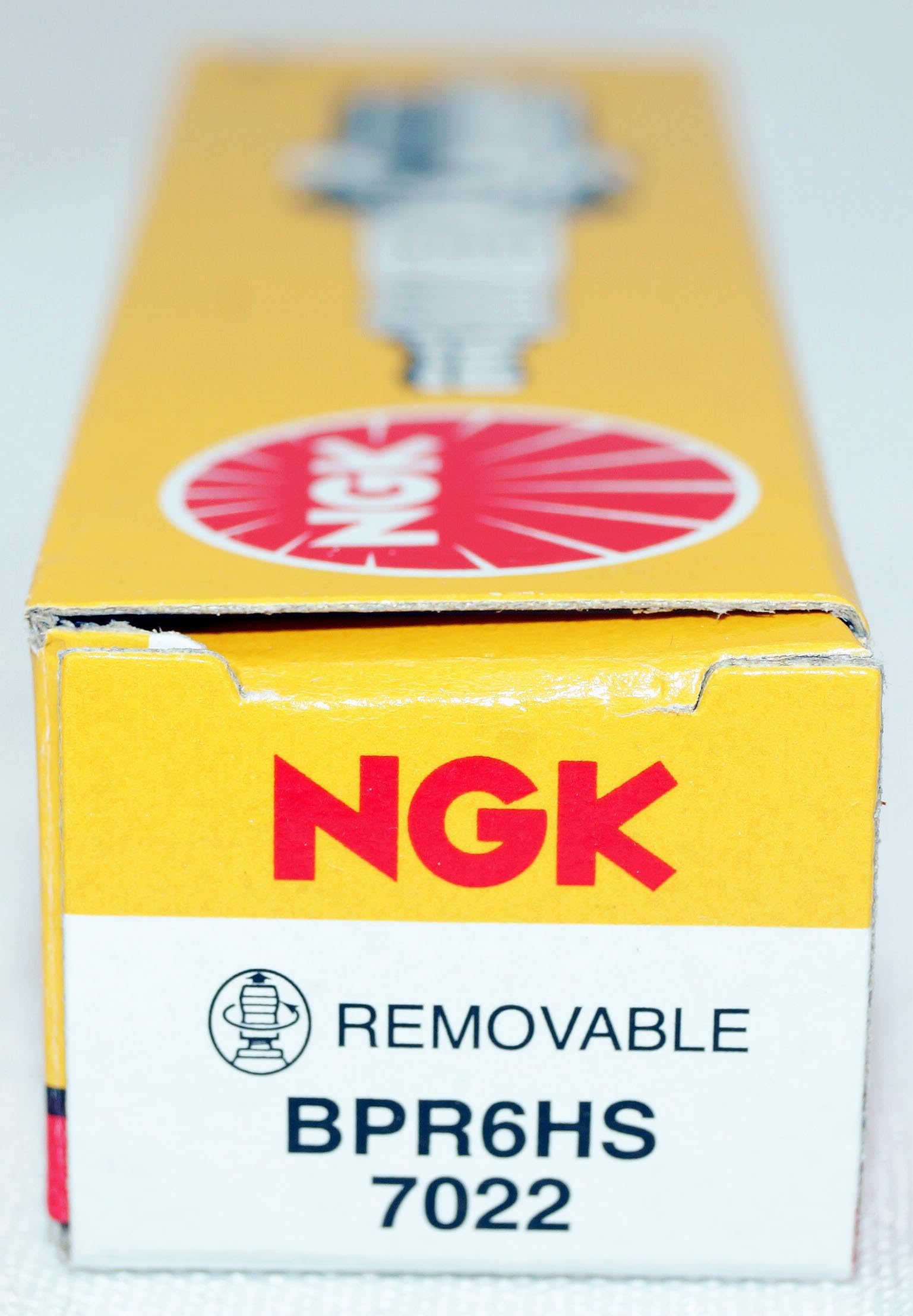 NGK BPR6HS spark plug shown with Ariens compatibility reference.