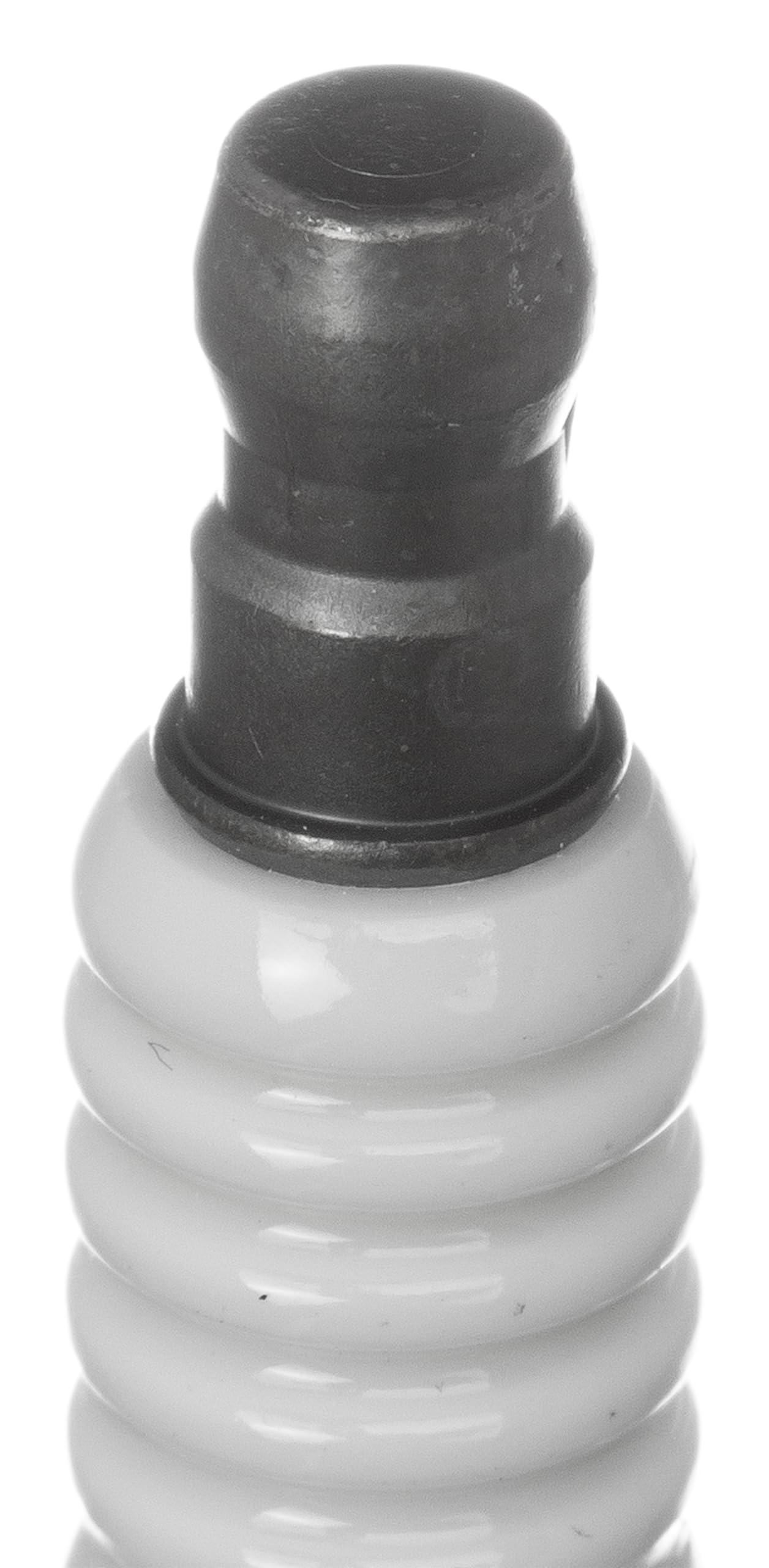 NGK spark plug core and nickel-tipped electrode emphasize durability and long life.