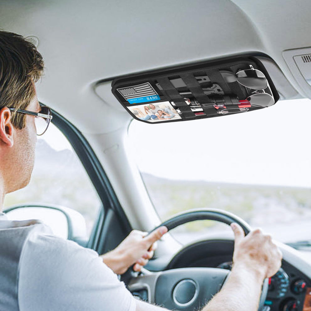 Nicofie sunglass holder on the car visor keeps glasses secure and accessible.