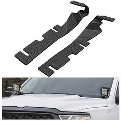 Nilight ditch light brackets on Dodge Ram hood hinges for secure offroad lighting.