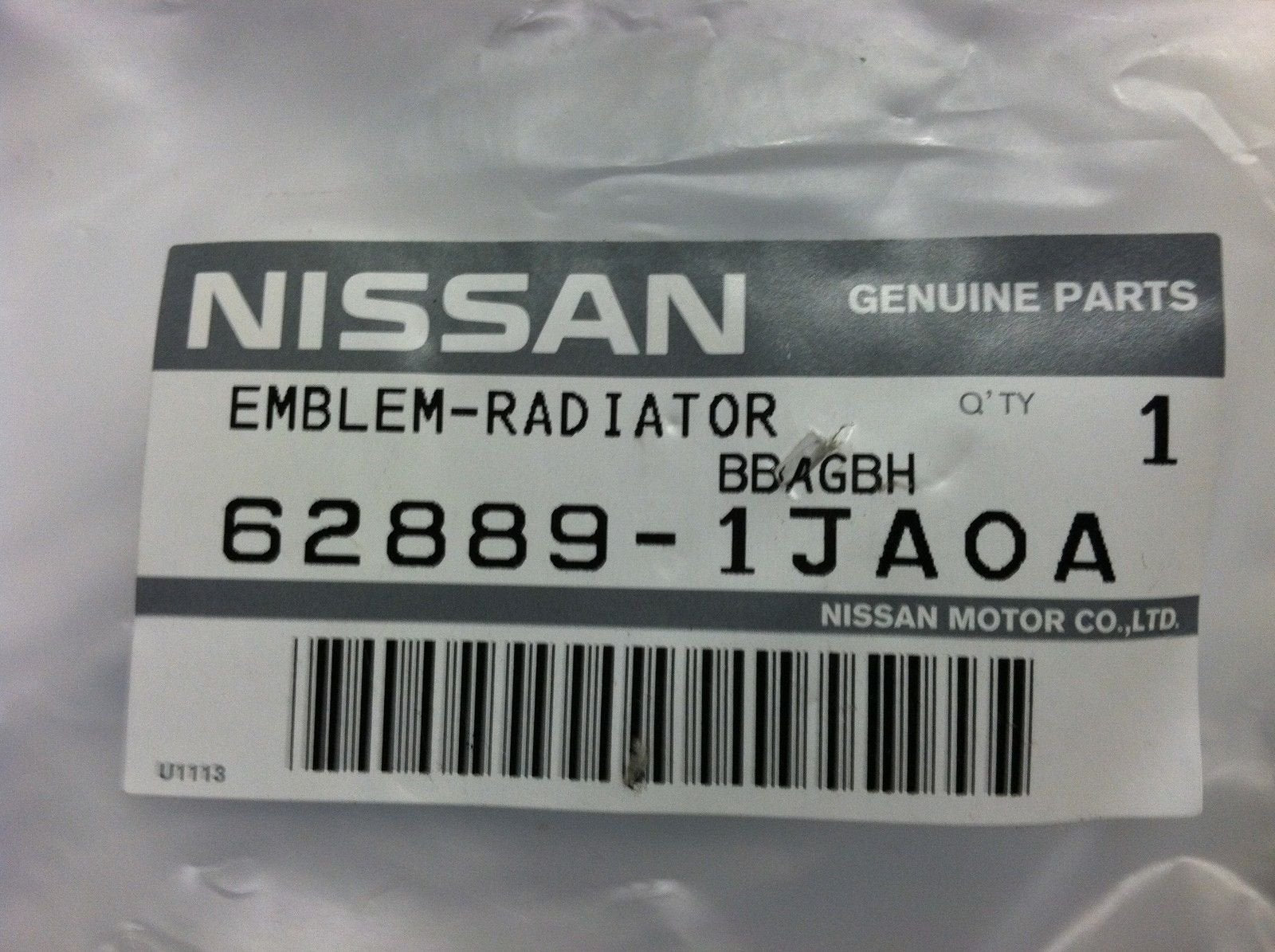Nissan emblem on Rogue grille with chrome detailing