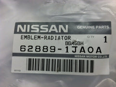 Nissan emblem on Rogue grille with chrome detailing