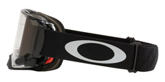 Oakley Airbrake MX goggles with clear roll-off for quick debris removal on the track