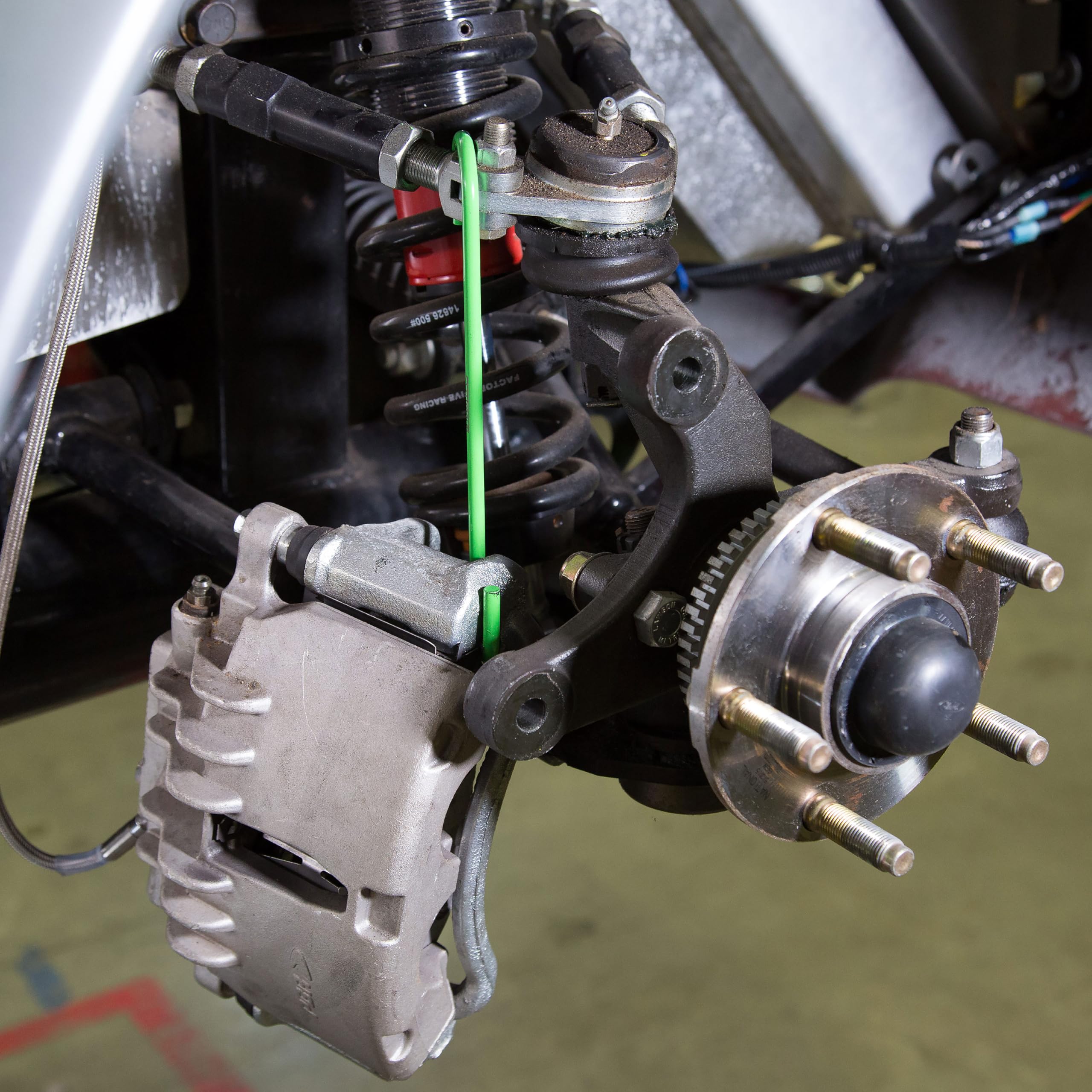 Eight-hook setup for full-vehicle brake and suspension service by OEMTOOLS