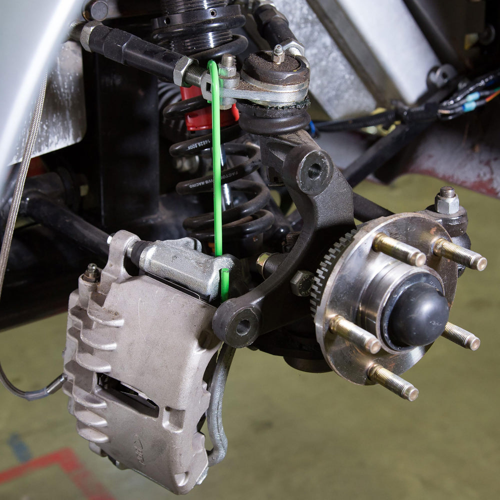 Eight-hook setup for full-vehicle brake and suspension service by OEMTOOLS