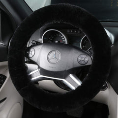OGLAND fluffy wool sheepskin steering wheel cover in black close-up showing plush texture for comfort