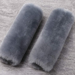 OGLAND authentic sheepskin pad emphasizing natural wool fibers and warmth.