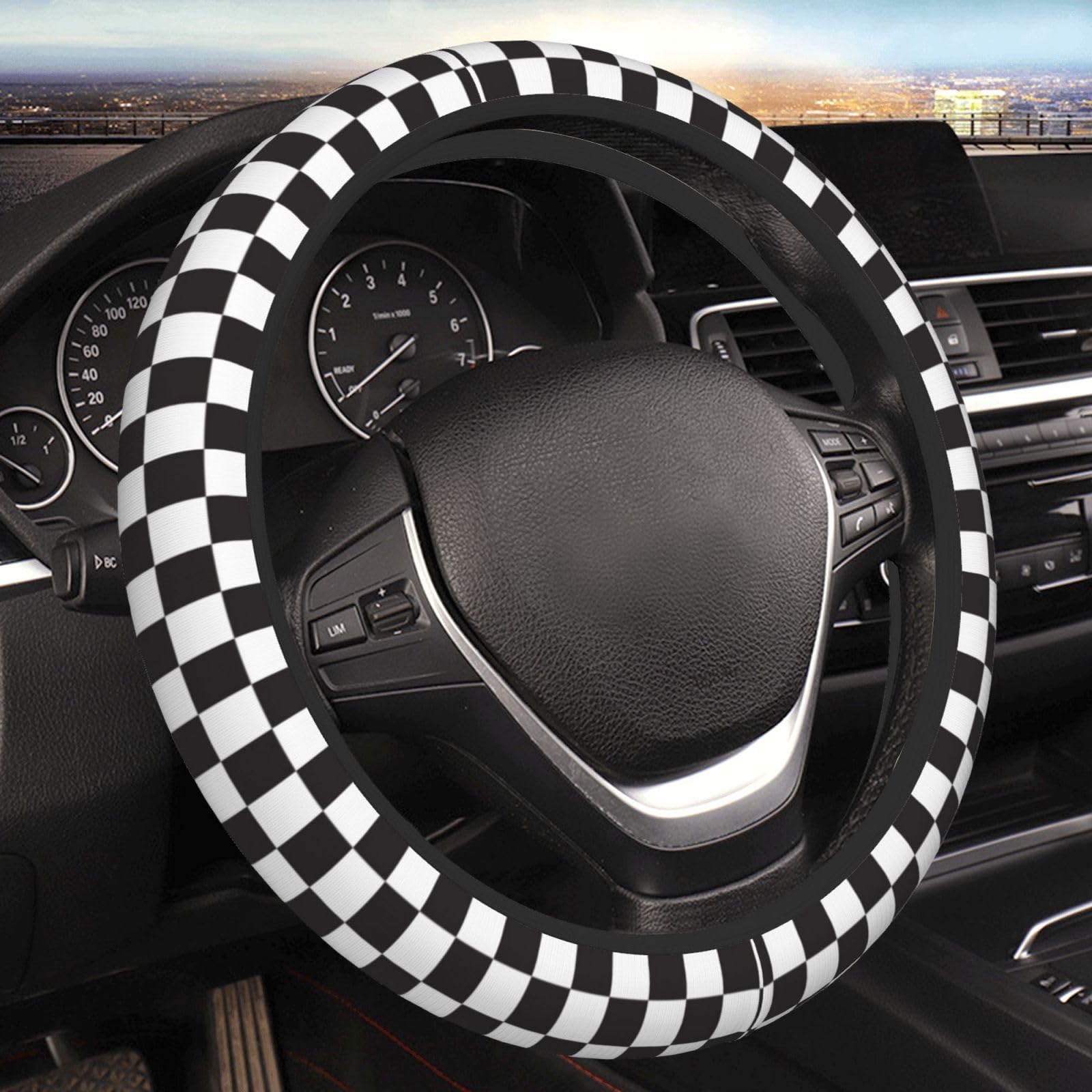 Olemier checkered steering wheel cover being installed for quick protection.