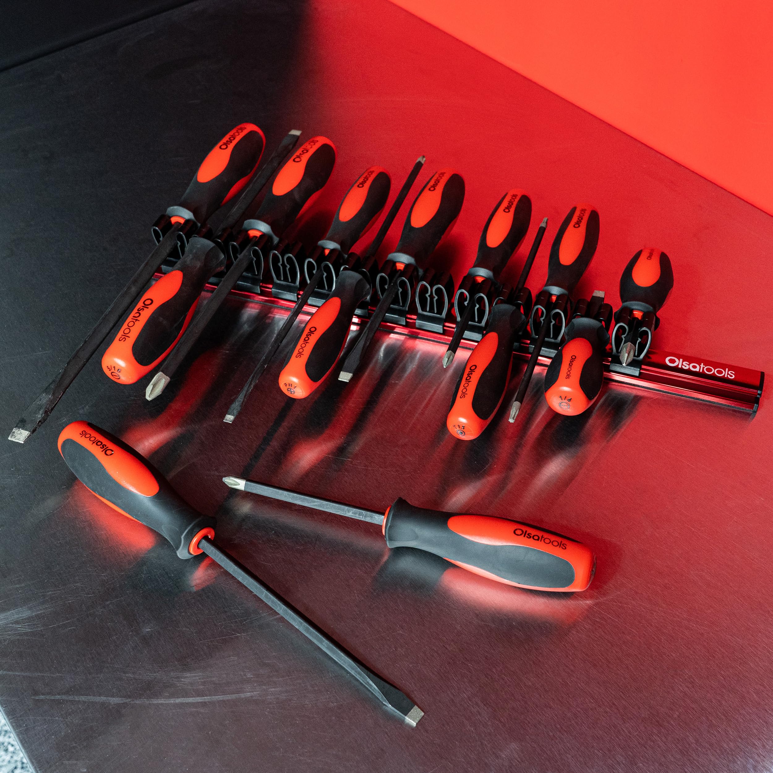 Olsa Tools flexible clips fit various tool sizes for easy organization.