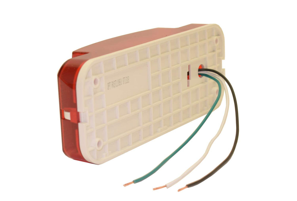 Optronics tail light hard-wired connection with separate ground wire.