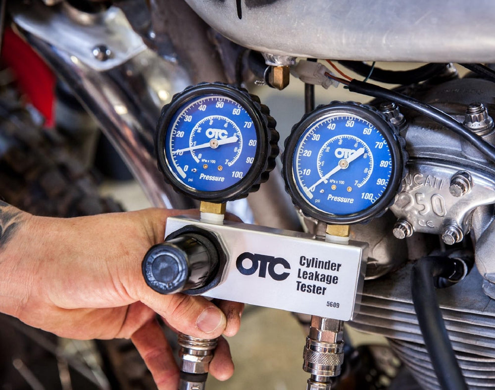 OTC 5609 dual gauges with chrome bezels enhancing readability during tests
