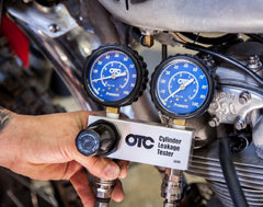 OTC 5609 dual gauges with chrome bezels enhancing readability during tests