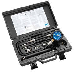 OTC 5605 Deluxe gauge close-up showing dual scale readings for quick compression checks