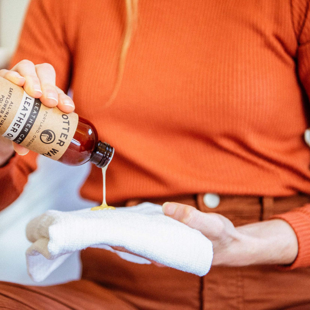 Otter Wax Leather Oil in car seats helps condition aged leather.