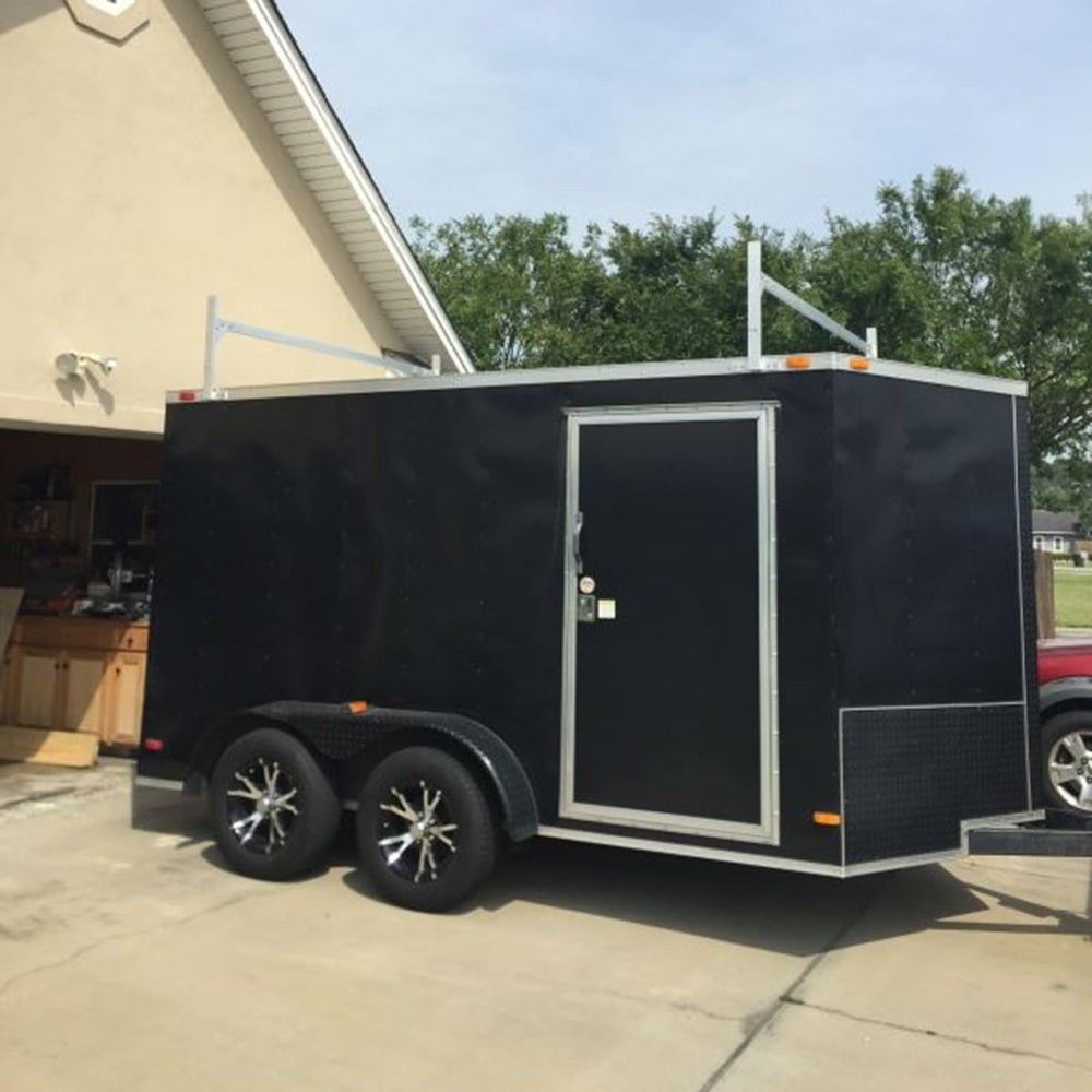 OUTPRIZE rack carries ladders and boards, keeping long cargo secure.