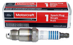 SP450X ASF42CX spark plug close-up showing robust metal threading and ceramic insulator