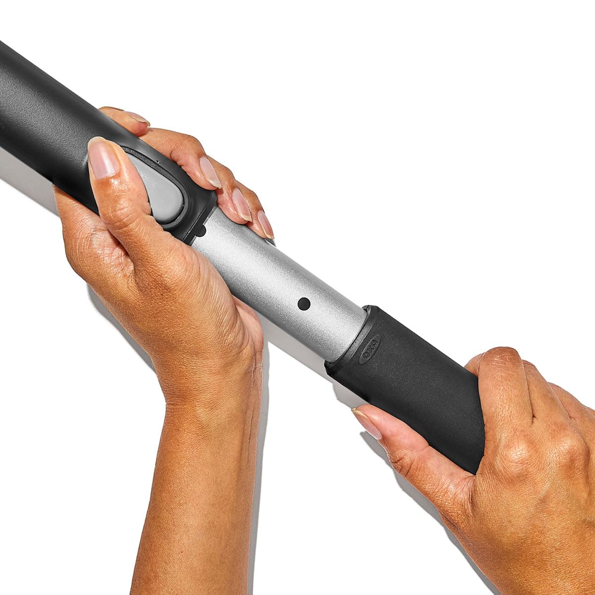 OXO Good Grips snowbrush feathered bristles protect paint while sweeping snow.