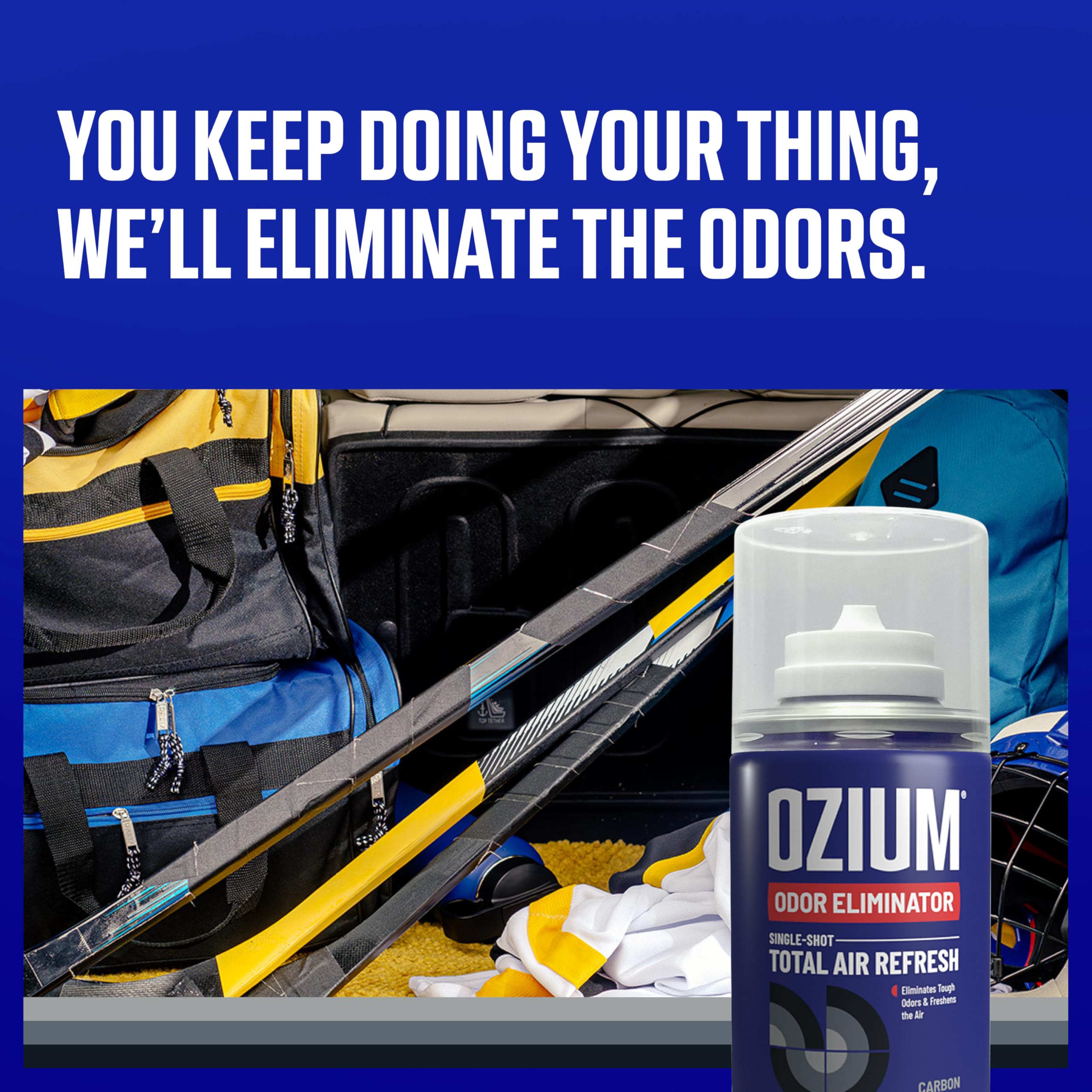 Ozium bottle dispensing action in car showing quick odor control