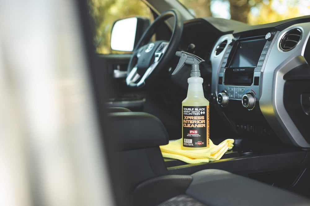 P & S Xpress Interior Cleaner on leather surface, gentle cleaning without damage.