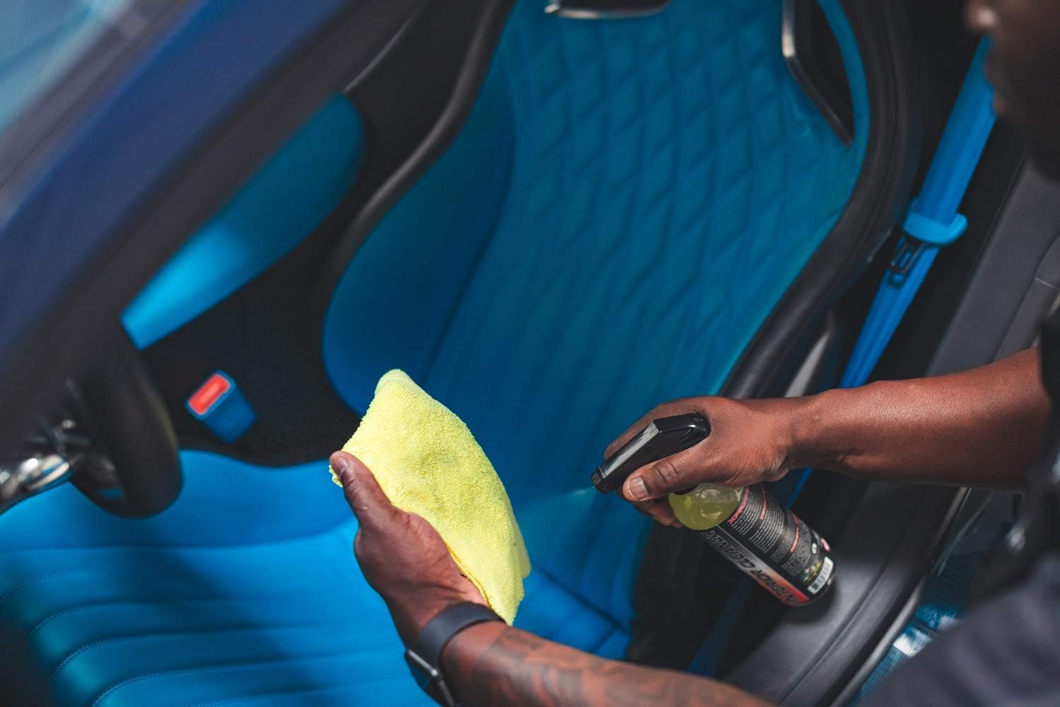 P & S Xpress Interior Cleaner sprayed on dashboard, quick dirt lift.