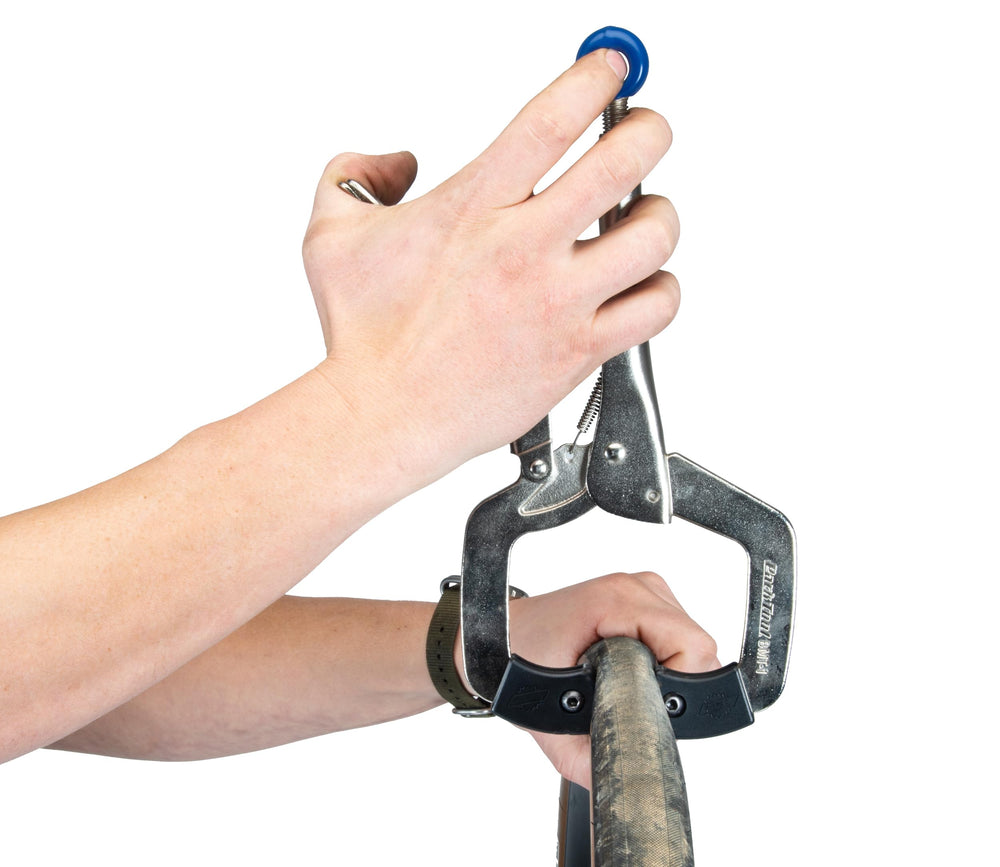 Non-marring jaw covers on Park Tool BMT-1 protect the rim during use.