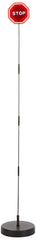Parkez flashing LED parking stop sign in a garage improves visibility and parking accuracy.