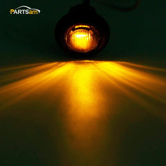 Partsam smoked-lens marker light enhances night signaling on trucks.