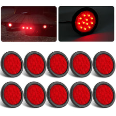 Partswcgg 4in round LED tail light, red front view, enhances trailer signaling and visibility on the road.