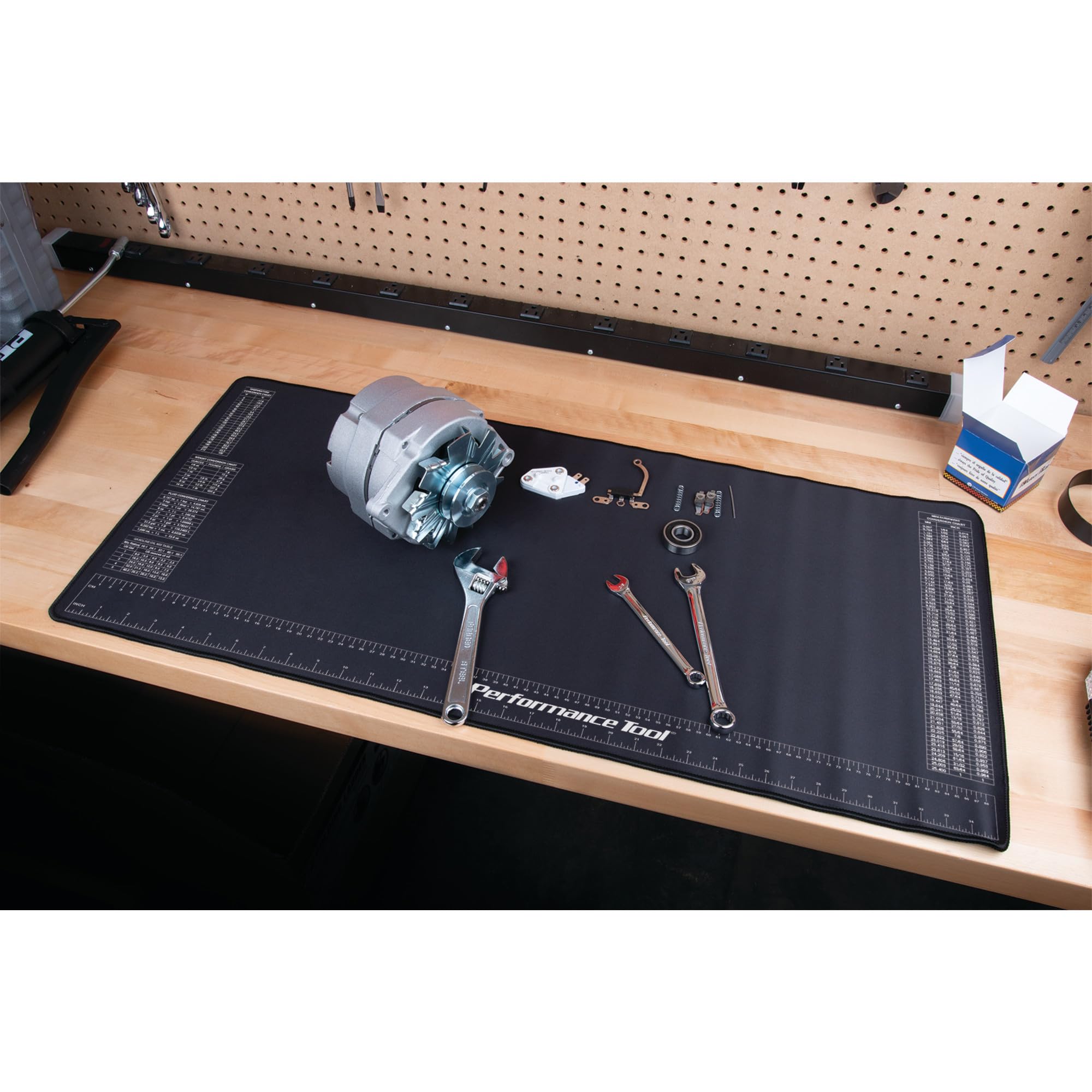 Organized workstation with Performance Tool neoprene mat used as a protective surface