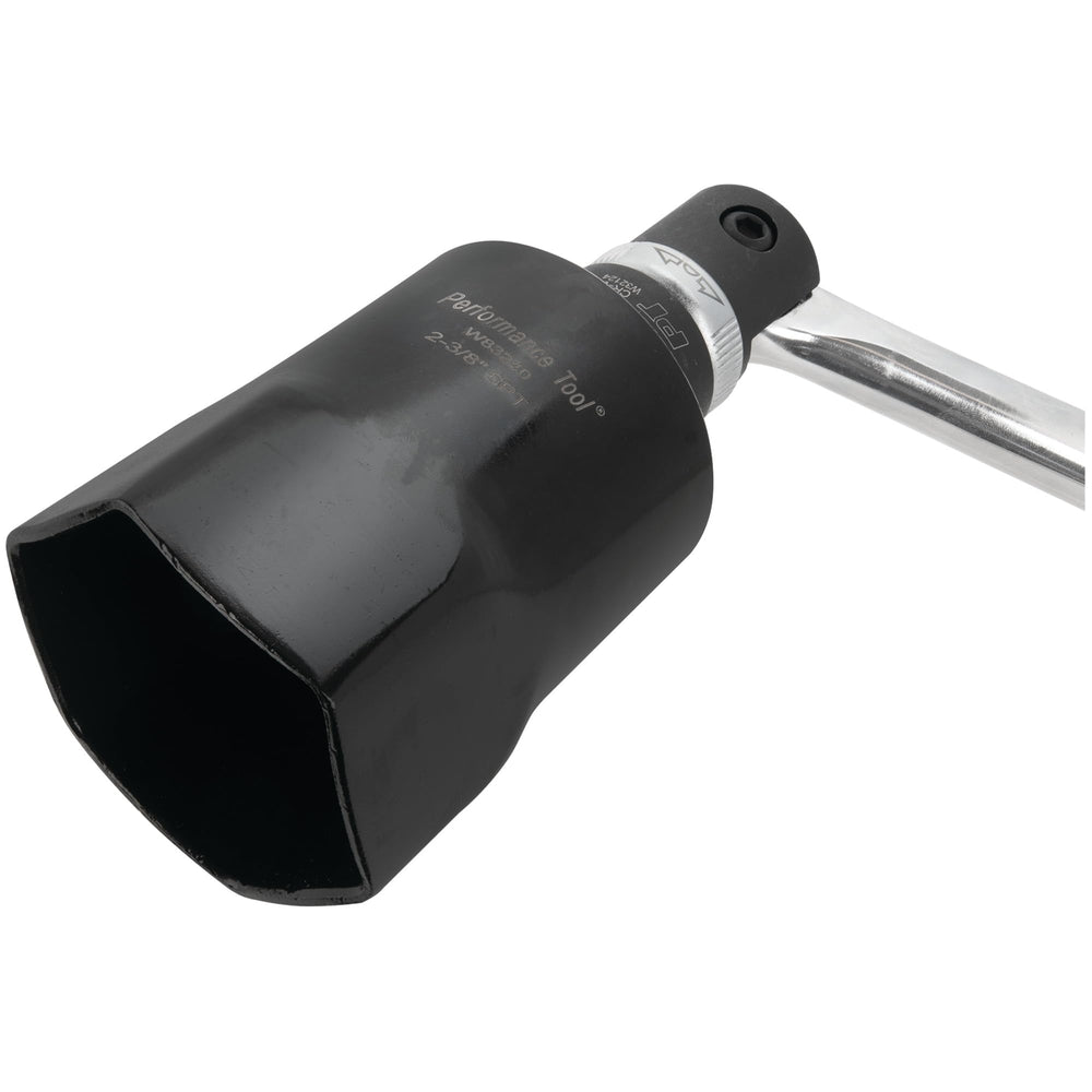 Performance Tool W83240 tool linked to a ratchet for efficient maintenance tasks.
