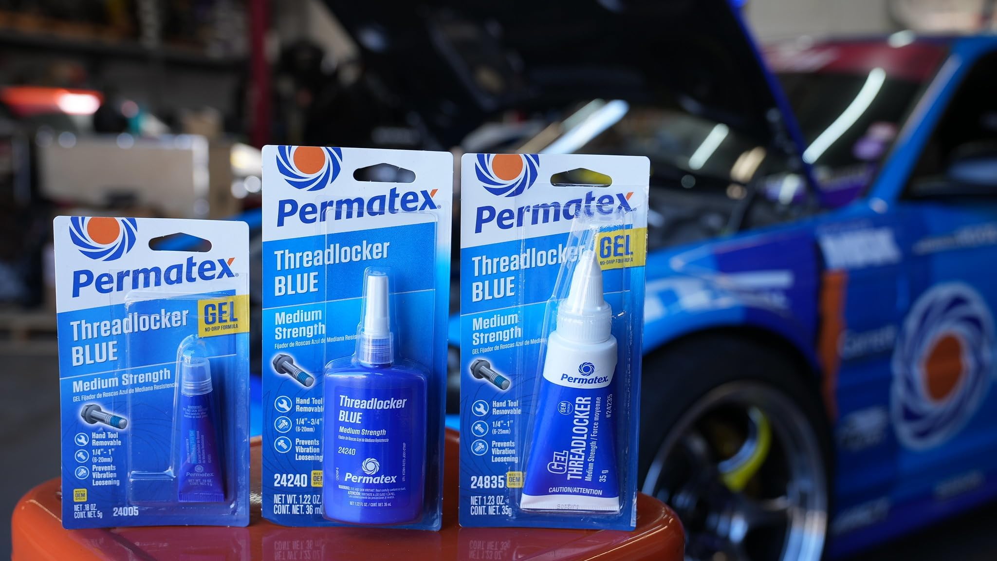 Hand tools remove Permatex 24240 for easy disassembly.