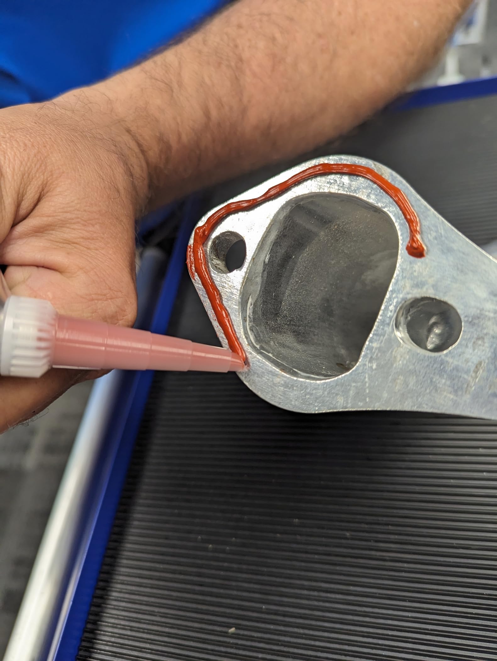 Formed-in-place gasket process using Permatex 81409 for valve covers and oil pans.