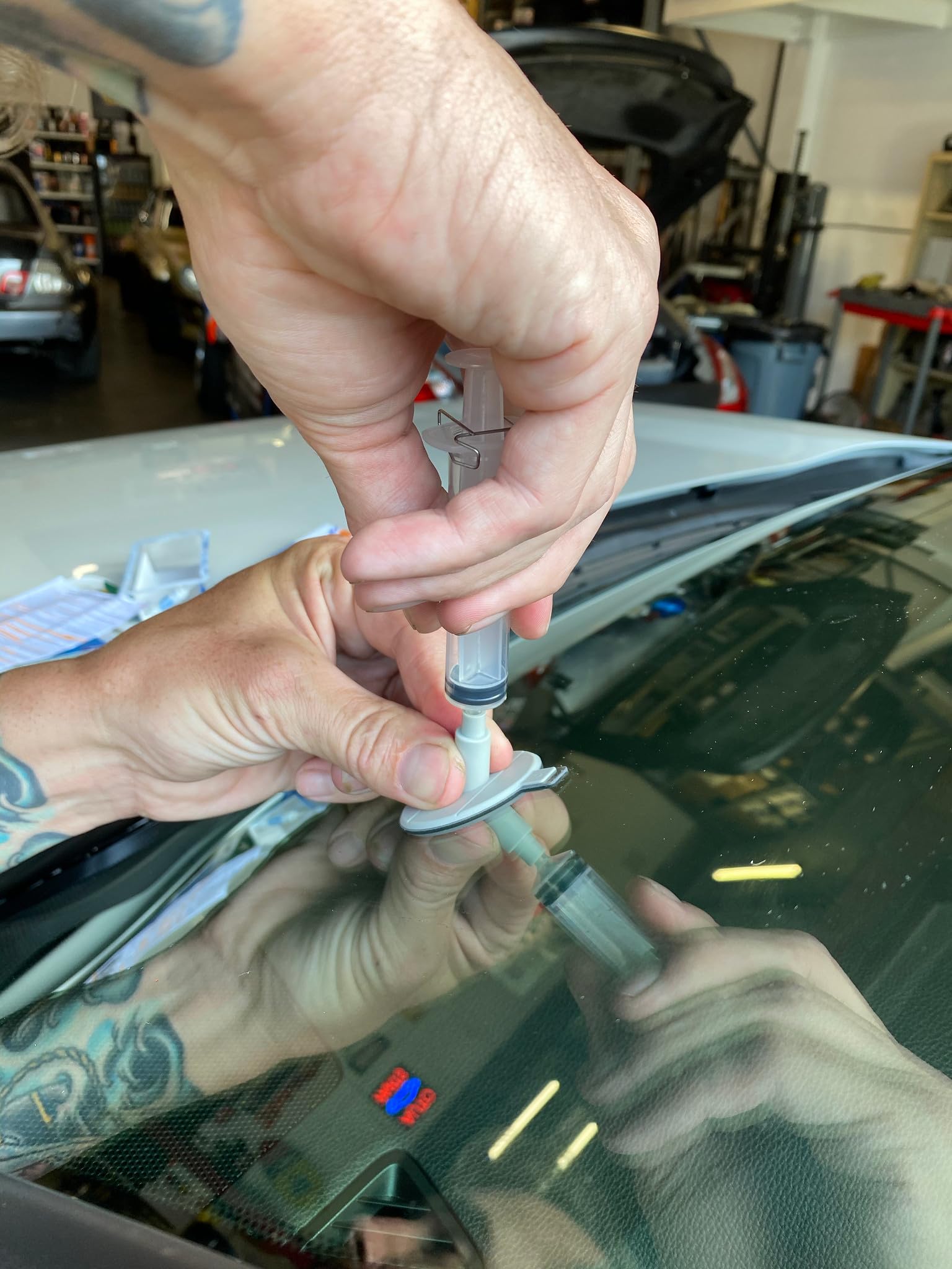 Repairs bullseye damage up to one and a quarter inches with Permatex.